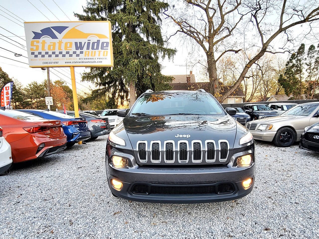 2015 Jeep Cherokee for sale at Statewide Auto LLC in Akron, OH