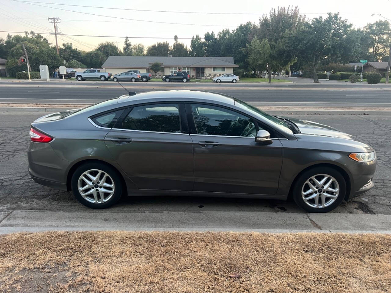 2014 Ford Fusion for sale at AUTO 4 LESS in Fresno, CA