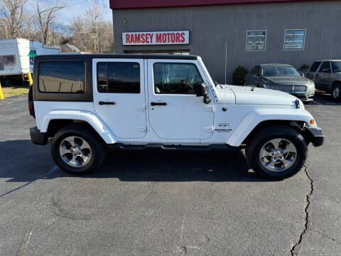 2017 Jeep Wrangler Unlimited for sale at Ramsey Motors in Riverside MO