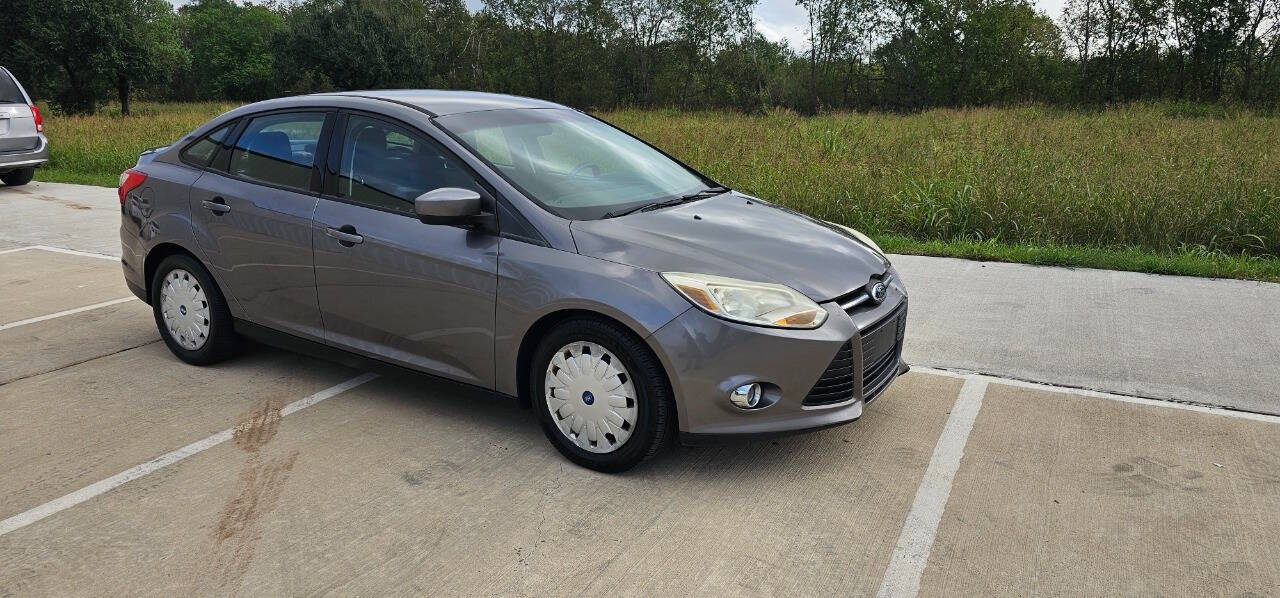 2012 Ford Focus for sale at CAR MARKET AUTO GROUP in Sugar Land, TX