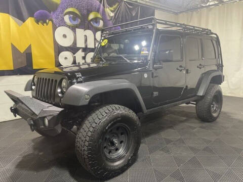2014 Jeep Wrangler Unlimited for sale at Monster Motors in Michigan Center MI