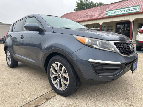 2015 Kia Sportage for sale at PITTMAN MOTOR CO in Lindale TX