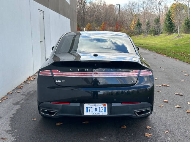 2015 Lincoln MKZ for sale at Phoenix Motor Co in Romulus, MI