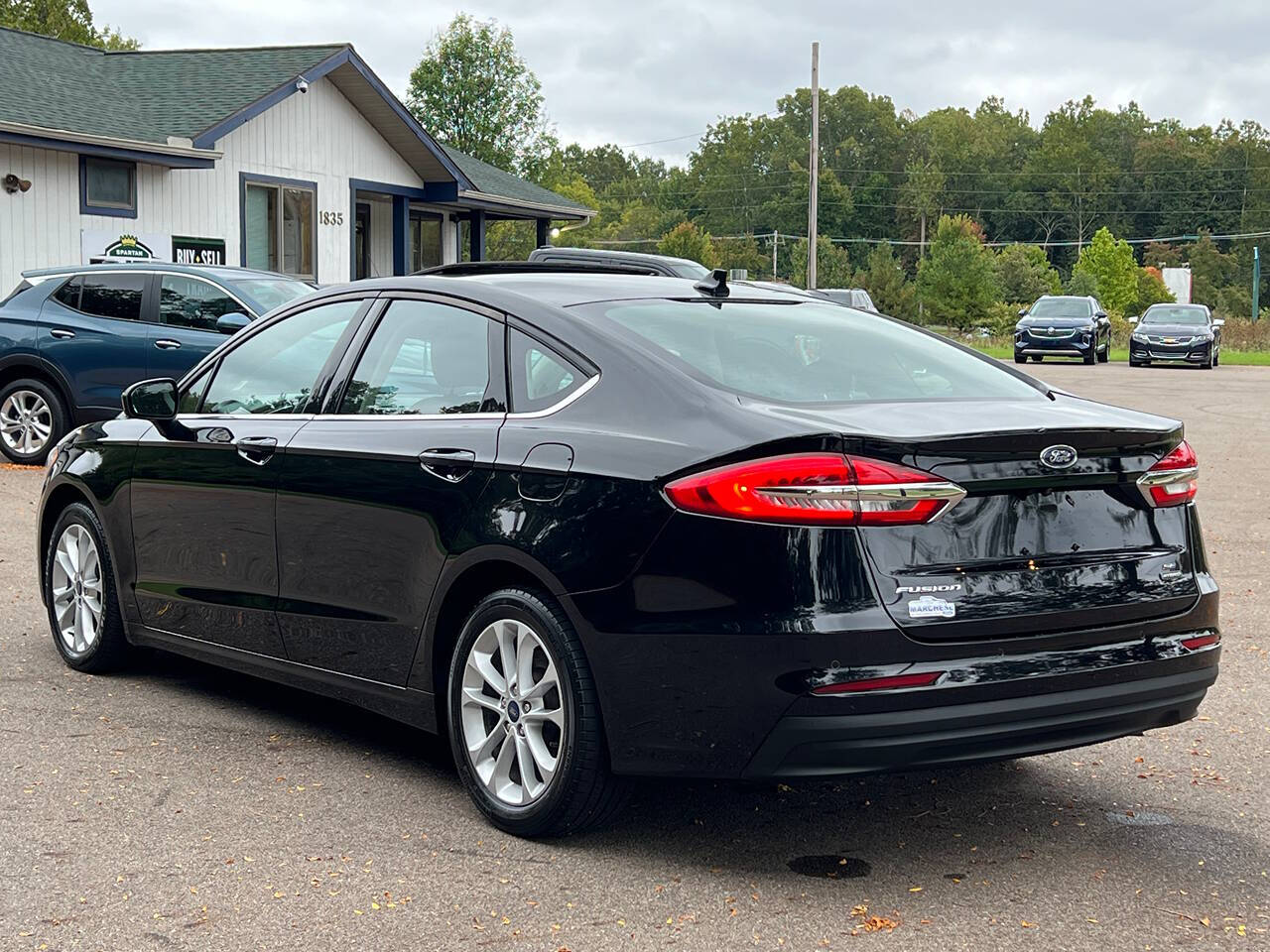 2020 Ford Fusion Hybrid for sale at Spartan Elite Auto Group LLC in Lansing, MI