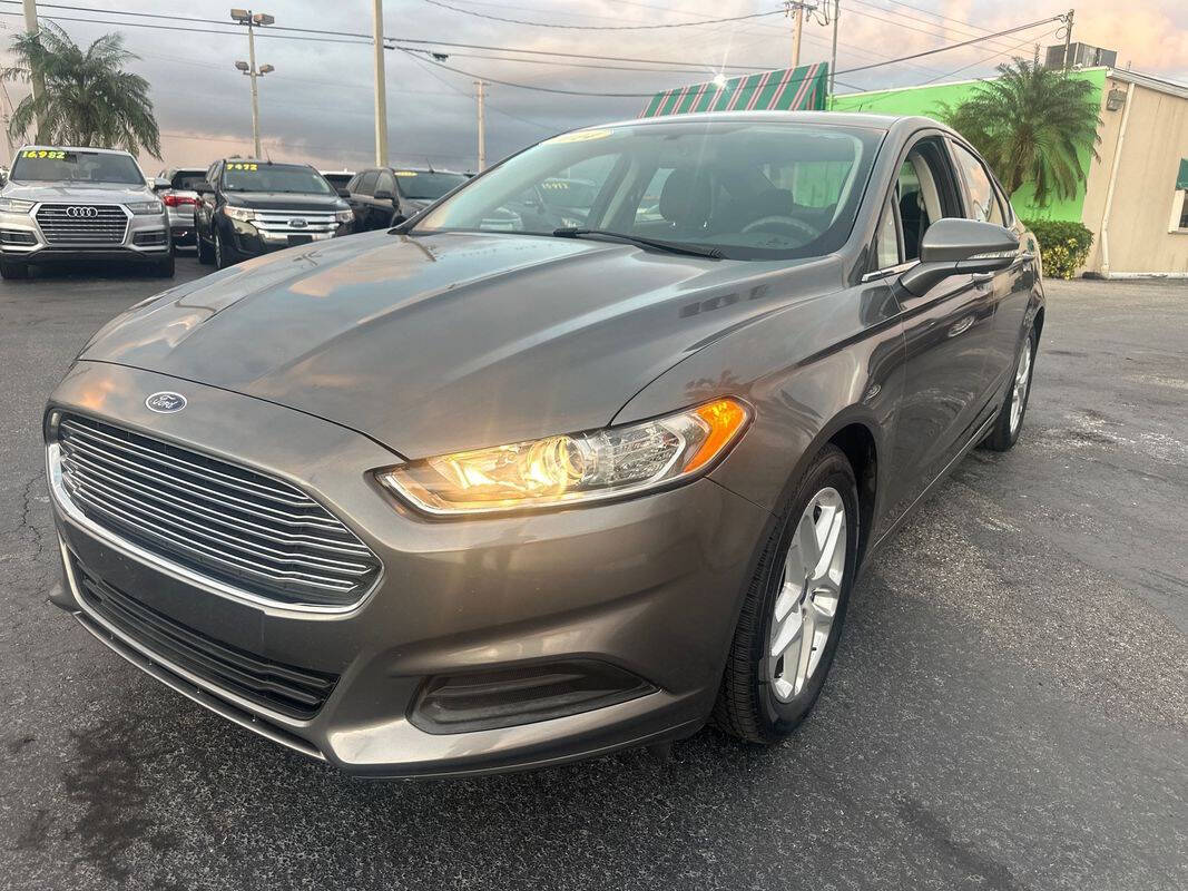 2014 Ford Fusion for sale at Tropical Auto Sales in North Palm Beach, FL