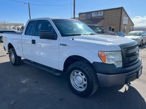 2014 Ford F-150 for sale at BERKENKOTTER MOTORS in Brighton CO