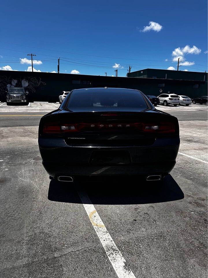 2012 Dodge Charger for sale at ALPHA AUTOMOTIVE SALES in Oakland Park, FL