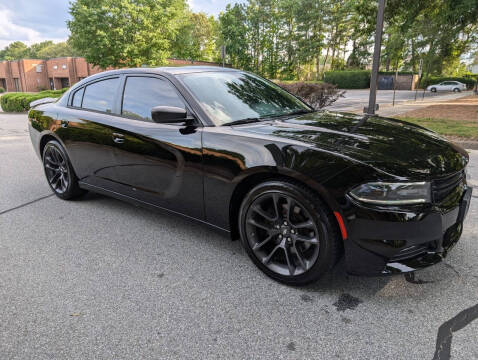 2015 Dodge Charger for sale at United Luxury Motors in Stone Mountain GA