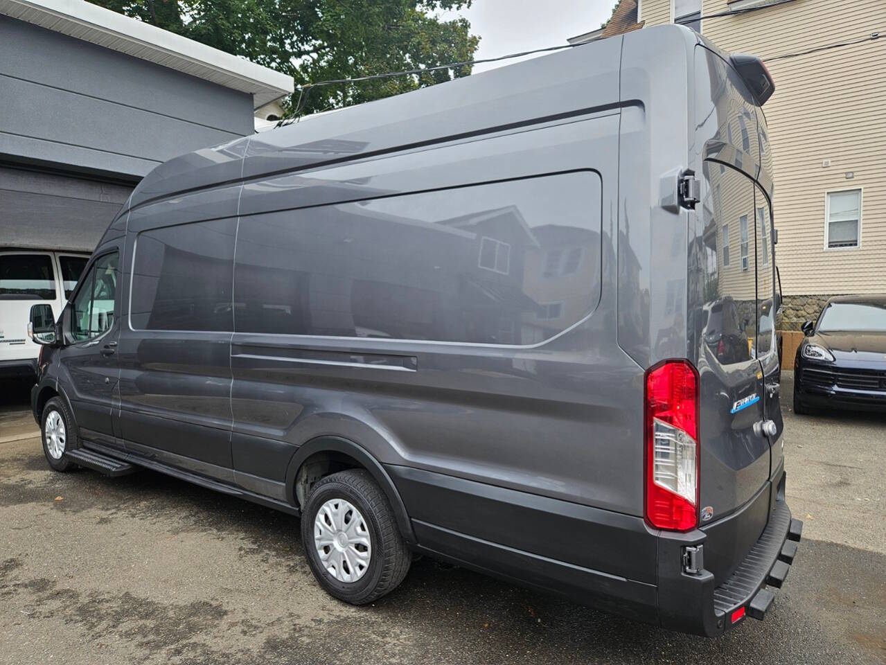 2023 Ford E-Transit for sale at RENOS AUTO SALES LLC in Waterbury, CT