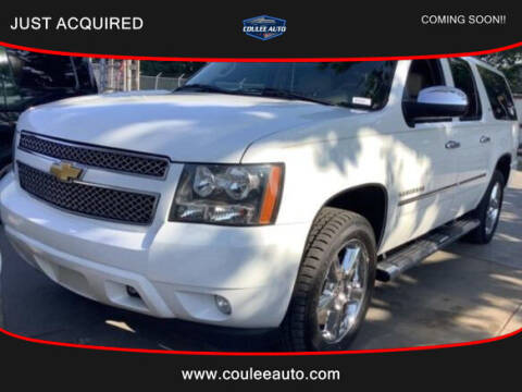 2013 Chevrolet Suburban for sale at Coulee Auto in La Crosse WI