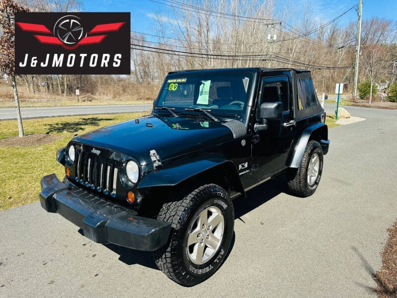 2009 Jeep Wrangler for sale at J & J MOTORS in New Milford CT