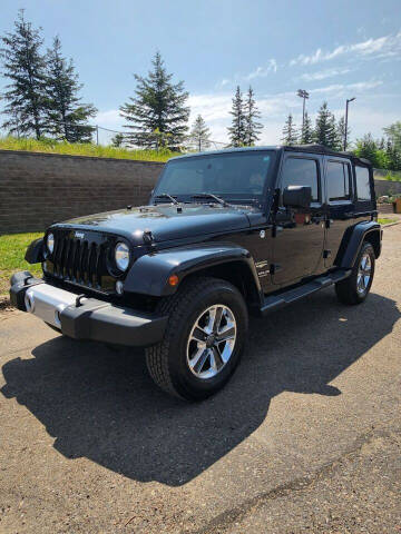 2015 Jeep Wrangler Unlimited for sale at MSRP Automotive in Rogers MN