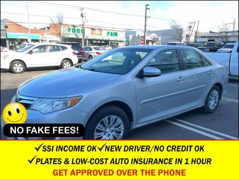 2014 Toyota Camry for sale at AUTOFYND in Elmont NY