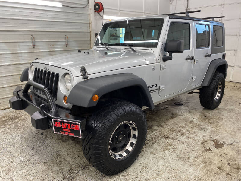 2010 Jeep Wrangler Unlimited for sale at Jem Auto Sales in Anoka MN