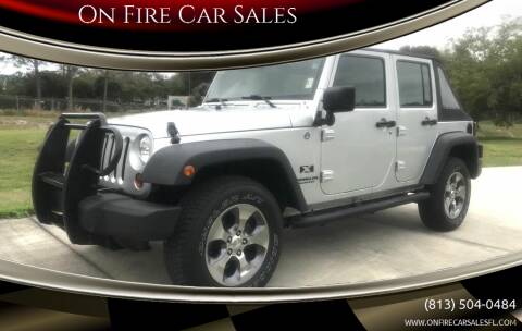 2009 Jeep Wrangler Unlimited for sale at On Fire Car Sales in Tampa FL