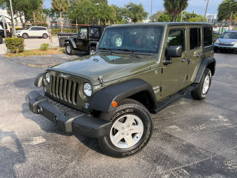 2015 Jeep Wrangler Unlimited for sale at MITCHELL MOTOR CARS in Fort Lauderdale FL