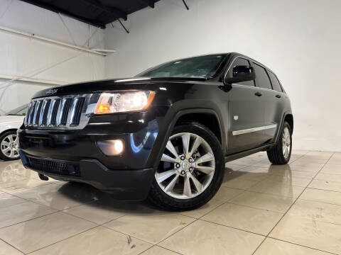 2011 Jeep Grand Cherokee for sale at ROADSTERS AUTO in Houston TX