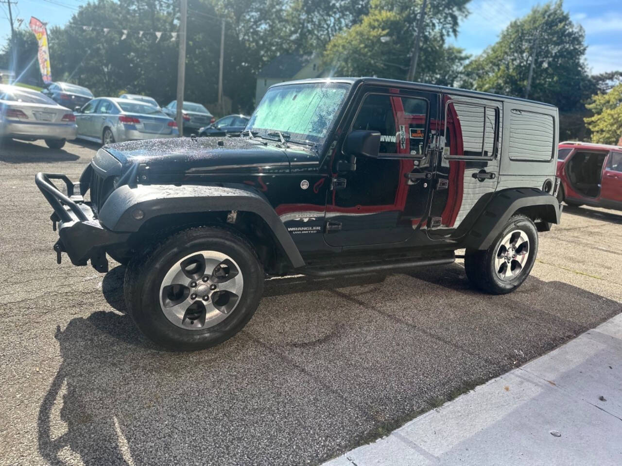 2016 Jeep Wrangler Unlimited for sale at BENZEN AUTO LLC in Ashtabula, OH