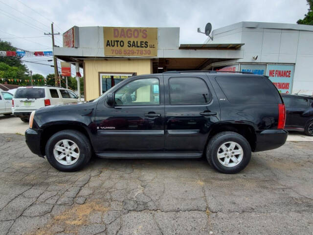 2008 GMC Yukon for sale at DAGO'S AUTO SALES LLC in Dalton, GA