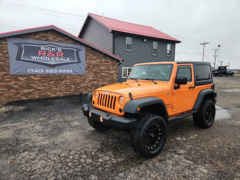2012 Jeep Wrangler for sale at Rick's R & R Wholesale, LLC in Lancaster OH