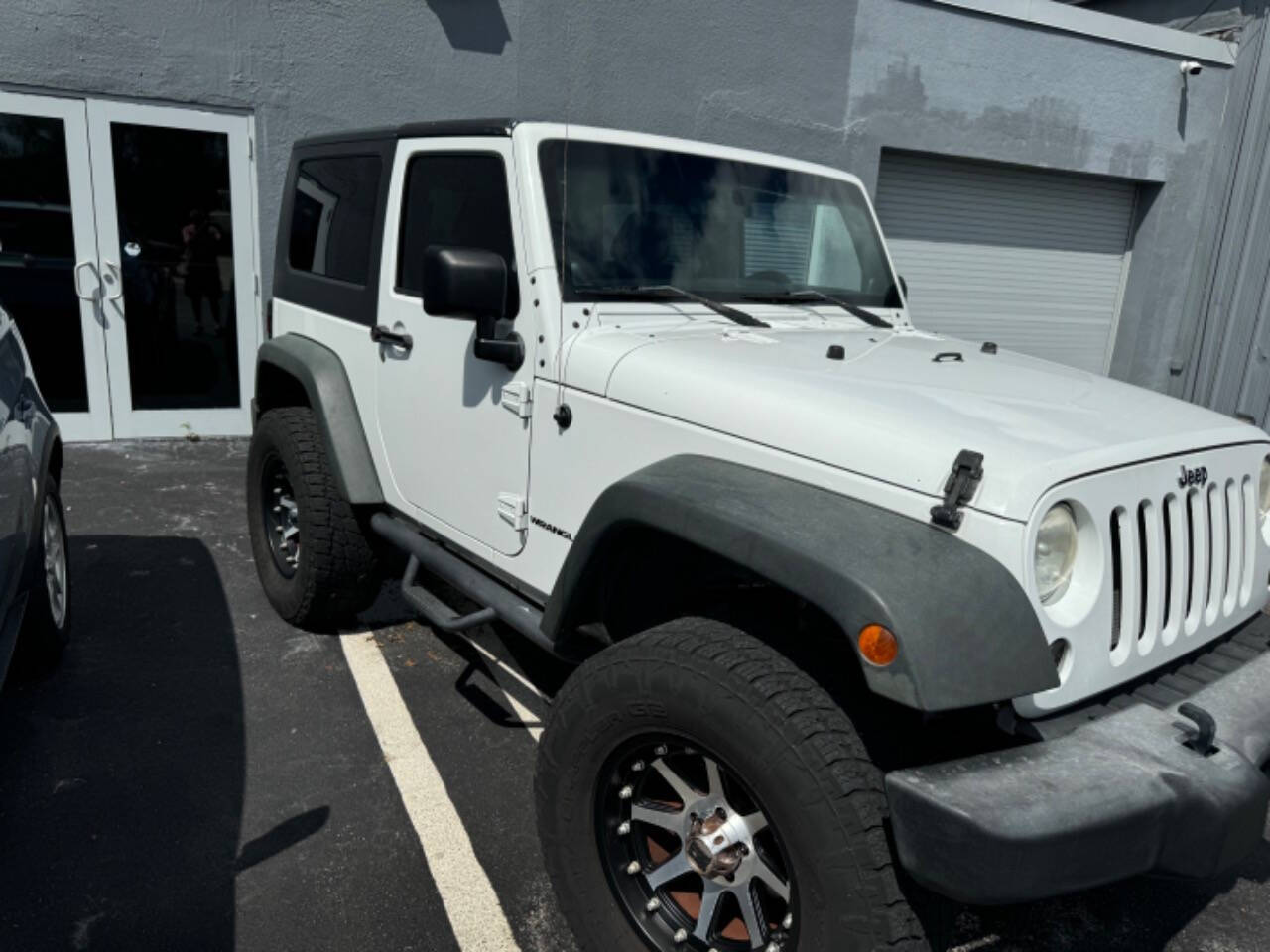 2011 Jeep Wrangler for sale at Amico Auto Sales in Margate, FL