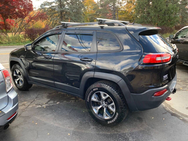 2014 Jeep Cherokee for sale at Chuckie Bizzarro's Fleetwing Auto in Erie, PA