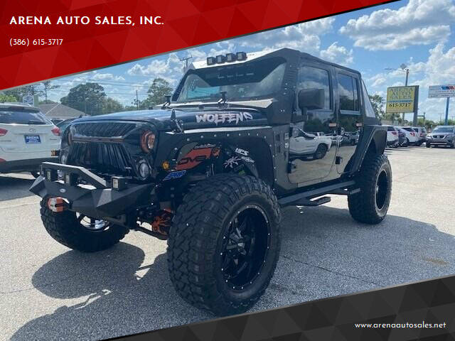 2017 Jeep Wrangler Unlimited for sale at ARENA AUTO SALES,  INC. in Holly Hill FL