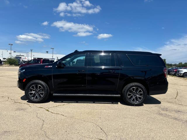 Used 2021 Chevrolet Suburban Z71 with VIN 1GNSKDKD8MR130983 for sale in Dubuque, IA