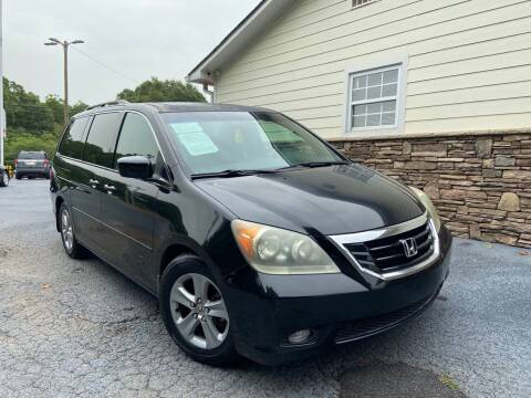2010 Honda Odyssey for sale at NO FULL COVERAGE AUTO SALES LLC in Austell GA