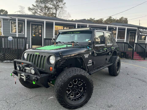 2013 Jeep Wrangler Unlimited for sale at Georgia Car Shop in Marietta GA