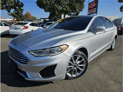 2019 Ford Fusion Hybrid for sale at MERCED AUTO WORLD in Merced CA