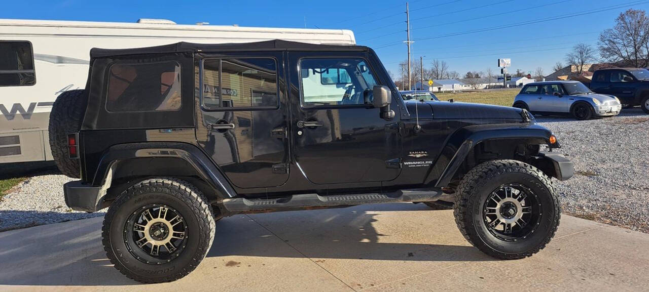 2013 Jeep Wrangler Unlimited for sale at CORNMAN AUTO LLC in Kirksville, MO