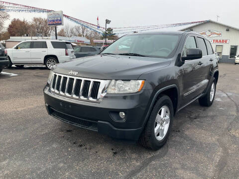 2011 Jeep Grand Cherokee for sale at Steves Auto Sales in Cambridge MN