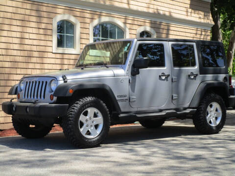 2013 Jeep Wrangler Unlimited for sale at Car and Truck Exchange, Inc. in Rowley MA