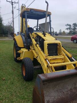 2006 New Holland 555E for sale at Interstate Bus Sales Inc. in Wallisville TX