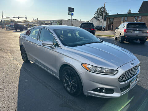 2015 Ford Fusion for sale at Carney Auto Sales in Austin MN