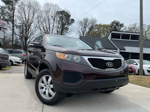 2012 Kia Sorento for sale at Alpha Car Land LLC in Snellville GA