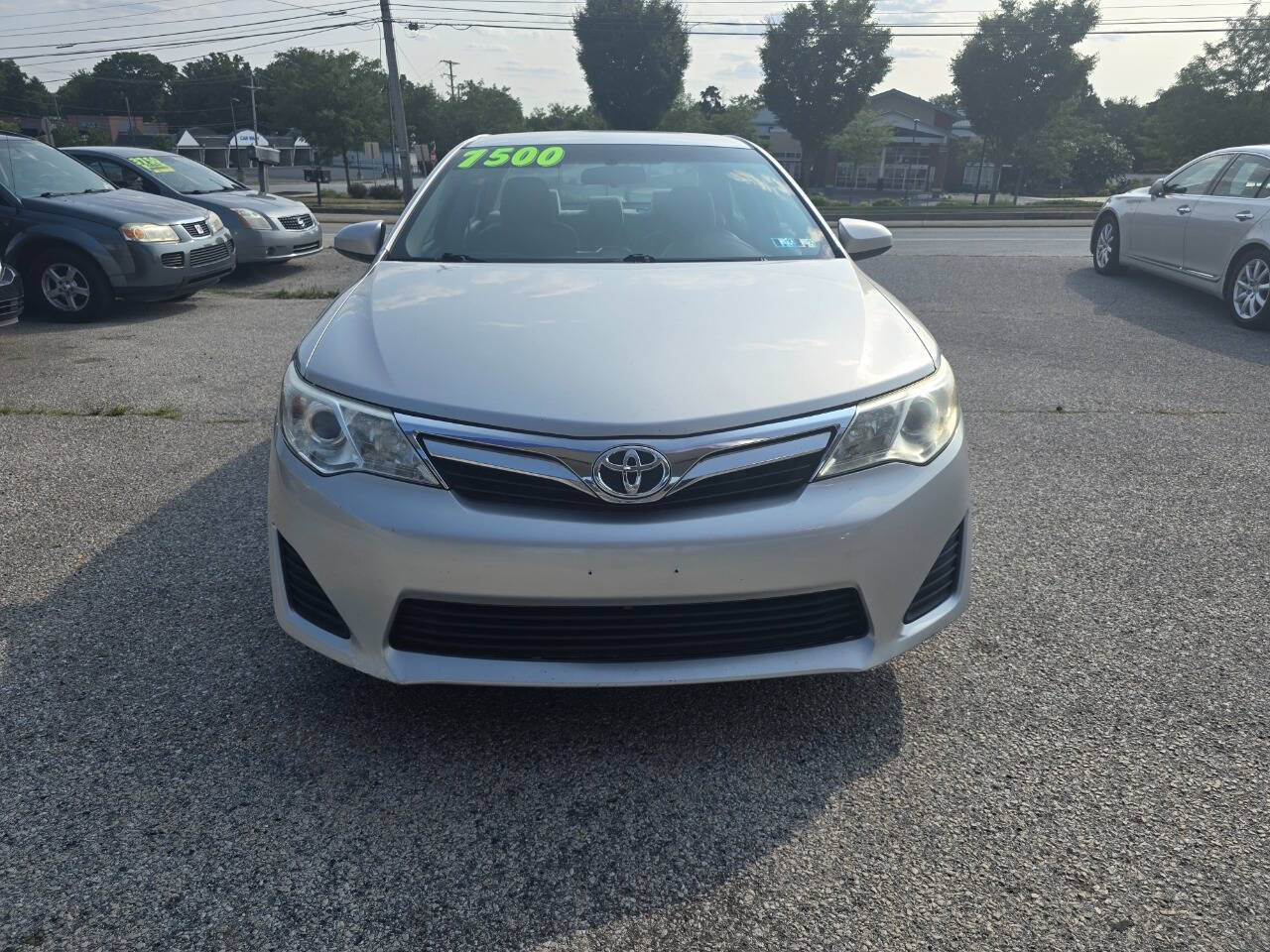 2012 Toyota Camry for sale at QUEENSGATE AUTO SALES in York, PA