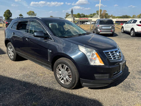 2015 Cadillac SRX for sale at Rick's R & R Wholesale, LLC in Lancaster OH