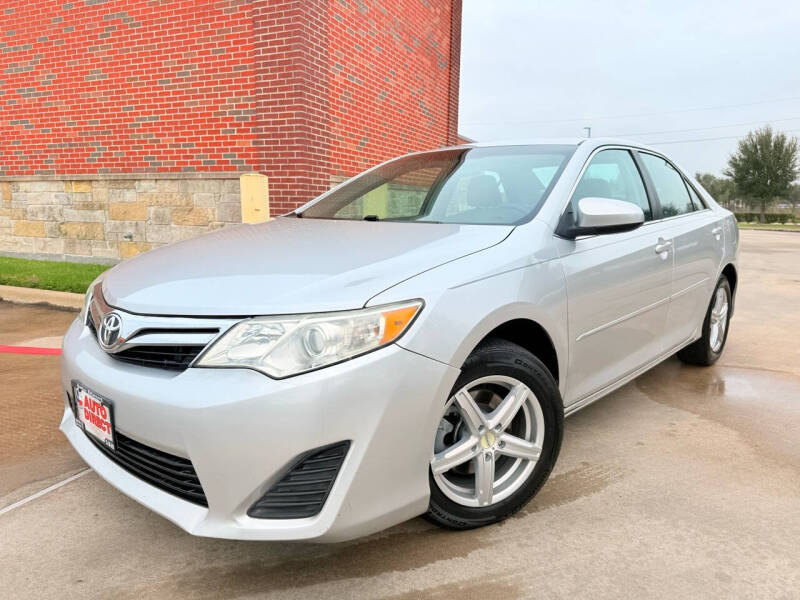 2013 Toyota Camry for sale at AUTO DIRECT in Houston TX