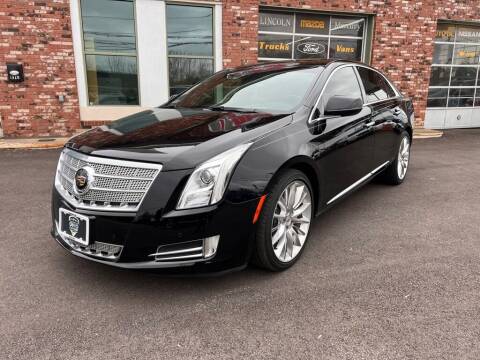 2013 Cadillac XTS for sale at Ohio Car Mart in Elyria OH