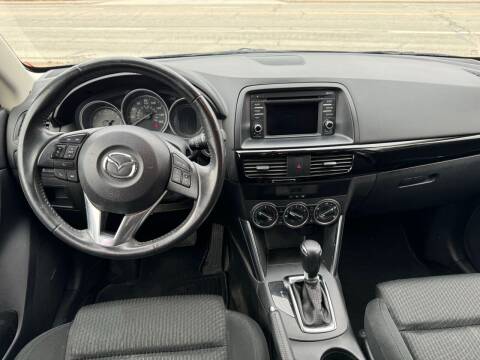 2014 Mazda CX-5 for sale at THELOT AUTO SALES LLC. in Lawrence KS