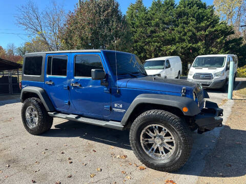 2009 Jeep Wrangler Unlimited for sale at Car Depot Auto Sales Inc in Knoxville TN