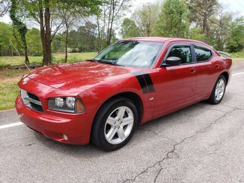2009 Dodge Charger for sale at GEORGIA AUTO DEALER, LLC in Buford GA