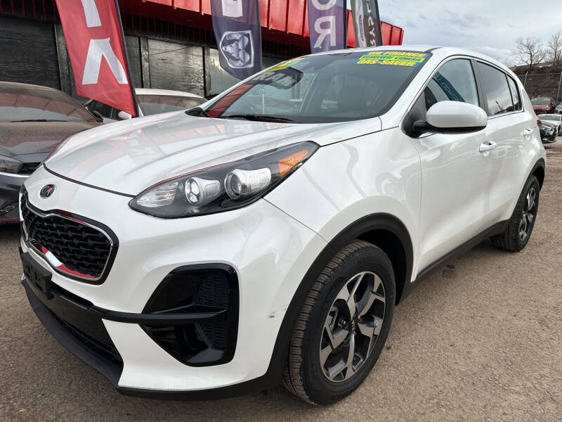 2021 Kia Sportage for sale at Duke City Auto LLC in Gallup NM
