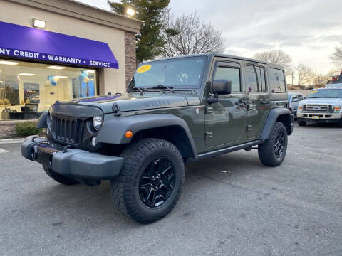 2015 Jeep Wrangler Unlimited for sale at CarMart One LLC in Freeport NY