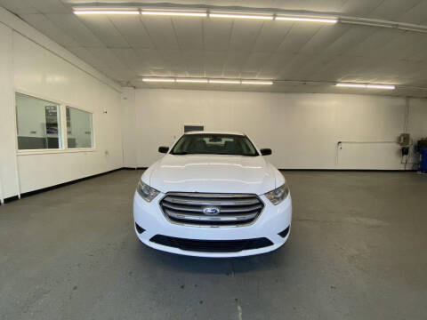 2015 Ford Taurus for sale at Icon Auto Group in Lake Odessa MI