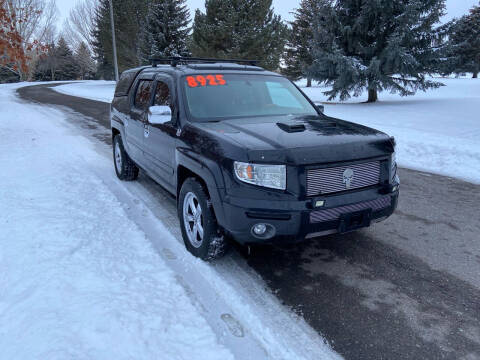 2006 Honda Ridgeline for sale at BELOW BOOK AUTO SALES in Idaho Falls ID