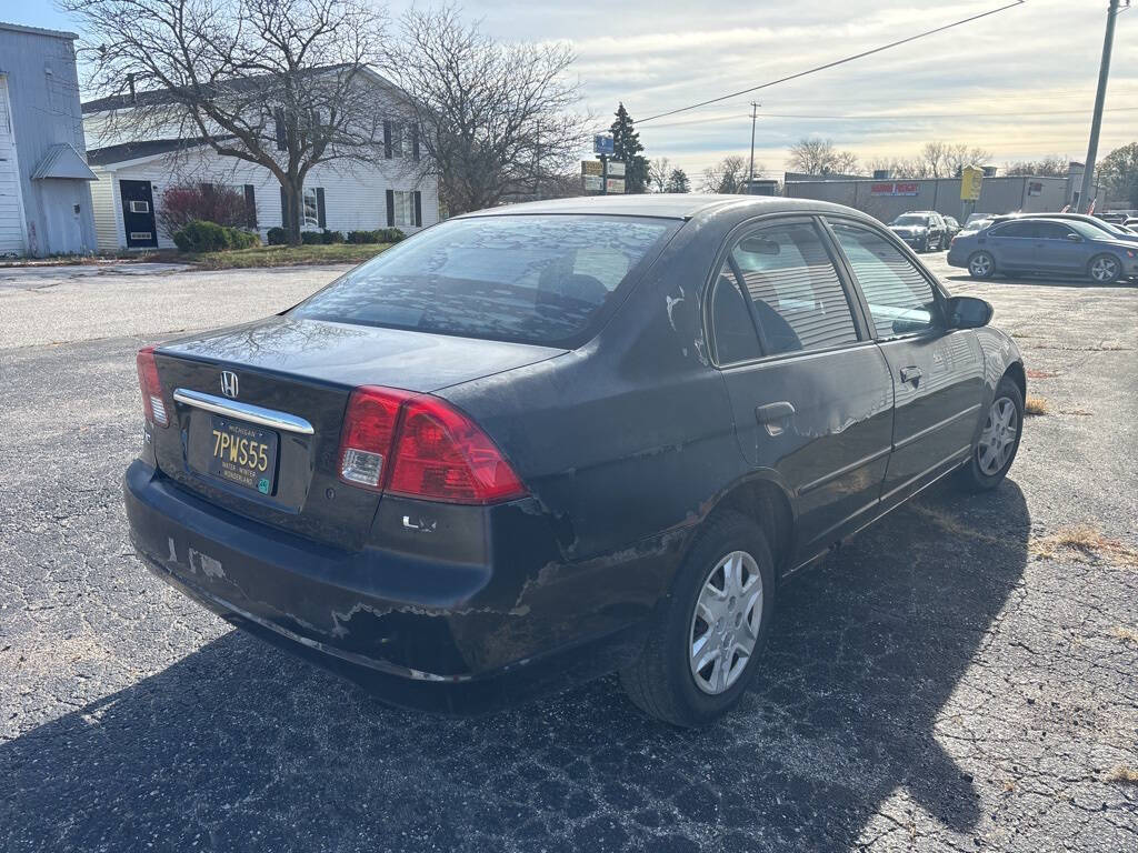 2003 Honda Civic for sale at DECKER AUTO SALES in Bay City, MI