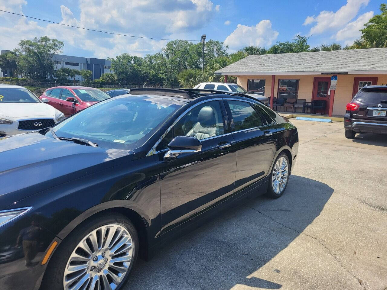 2016 Lincoln MKZ for sale at FAMILY AUTO BROKERS in Longwood, FL